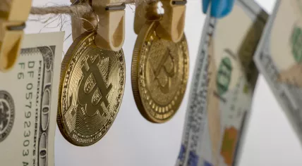 Money laundering concept with Bitcoin coins