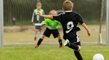 Children playing football