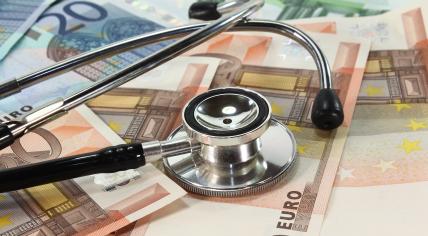 A stethoscope on a stack of euros