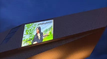 Image of Masha Amini projected onto the EYE film museum in Amsterdam, 27 September 2022