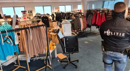 Police bust a massive fake designer clothing operation on Rivium Promenade in Capelle aan den IJssel, 27 September 2022