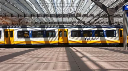 An NS Sprinter train waiting on a platform at Rotterdam Centraal in 2014