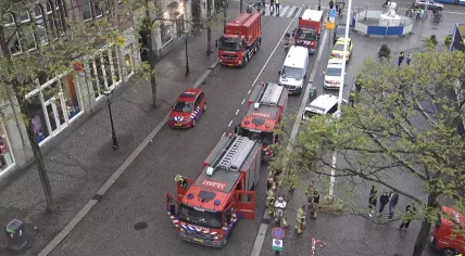 Emergency services respond to a fire at the Grand Hotel Krasnapolsky on Dam Square in Amsterdam, 21 October 2022