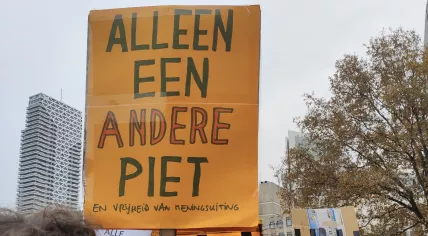 A sign calling for an end to the use of blackface to portray Zwarte Piet. 16 November 2019