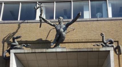 Hubert van Lith's sculpture, Aesculapius, above the entrance to the former Haga Hospital & Red Cross Hospital in The Hague. 9 July 2011