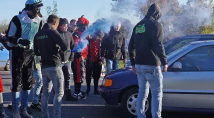 A group of young men, some dressed in blackface as Zwarte Piet, try to prevent Kick Out Zwarte Piet protestors from arriving in Staphorst. 19 November 2022