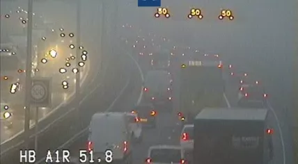 Traffic building up on a foggy morning on the A1 near Barneveld, 21 November 2022