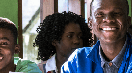 A student in a classroom participating in a Young Africa program