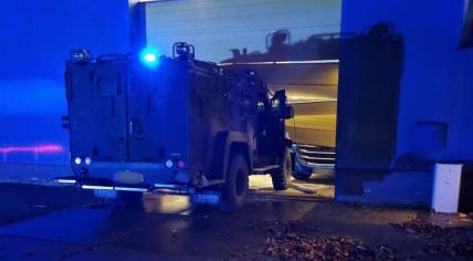 Truck enters warehouse in Netherlands.