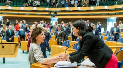 Simone Roos (L) is congratulated by Tweede Kamer Chair Khadija Arib on Roos's appointment as Clerk of the Tweede Kamer. 11 June 2018