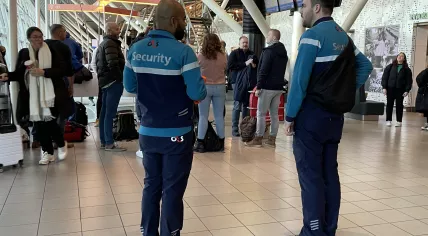 Security personnel at Schiphol Airport. 13 December 2022