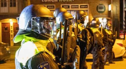 Riot police in Amsterdam during disturbances after Morocco beat Canada in the Qatar World Cup, 1 December 2022