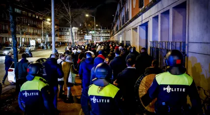Police on Vaillantlaan in The Hague where supporters of Morocco's football team celebrate their World Cup victory over Spain. 6 December 2022
