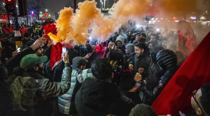 Morocco’s football fans celebrate in Mercatorplein, Amsterdam, after the quarterfinal victory over Portugal during the 2022 World Cup. 10 December 2022