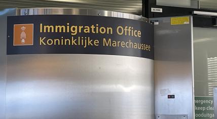 An immigration checkpoint operated by the Marechaussee at Schiphol Airport. 13 December 2022