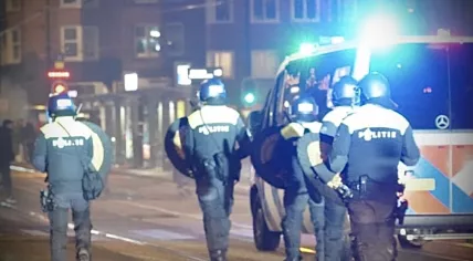 Police break up Morocco football supporters on Tussen Meer in Amsterdam. 11 December 2022