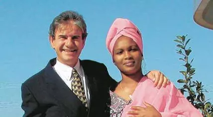 Tob Cohen with his arm around Sarah Wairimu