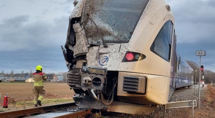 The damage to the leading Arriva train carriage after it slammed into a street sweeper car at a crossing in Tienray, Limburg, that killed the car's driver. 28 December 2022