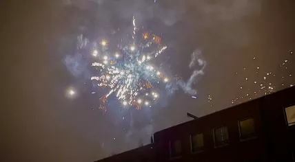 Fireworks set off on New Year’s Day explode in front of clouds of smoke in Amsterdam. 1 January 2023