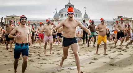 Thousands take part in the annual New Year’s Dive at Scheveningen Beach. 1 January 2023