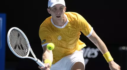 Tallon Griekspoor of the Netherlands plays a forehand return to Stefanos Tsitsipas of Greece during their third round match at the Australian Open tennis championship in Melbourne, Australia, Friday, 20 Jan 2023. 