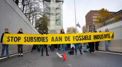 Extinction Rebellion activists block the Utrechtsebaan of the A12 highway in The Hague to protest against fossil fuel subsidies, 26 November 2022