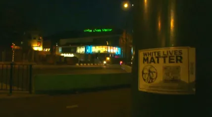 A laser projector displayed “White Lives Matter” on a Primark in Venlo, where activists also used stickers to promote the white supremacist group’s Telegram channel. December 2022
