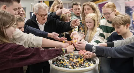 Jeroen Krabbé with students from De Nieuwe Veste who helped collect supplies for the a new memorial dedicated to children killed during the Holocaust. 27 January 2023
