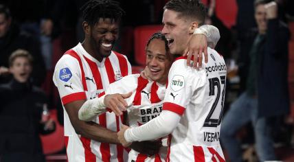 Xavi Simons of PSV Eindhoven celebrates the 2-0 with his teammates during the Dutch eredivisie match between PSV Eindhoven and FC Groningen in the Phillips stadium on 11 February 2023 in Eindhoven, Netherlands. 