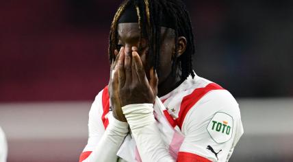 Johan Bakayoko of PSV Eindhoven disappointed after the UEFA Europa league play-off match between PSV Eindhoven and Sevilla FC in the Phillips stadium on 23 February 2023 in Eindhoven, Netherlands.