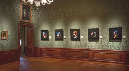 Recreations of Vermeer's Girl with a Pearl Earring in the Mauritshuis