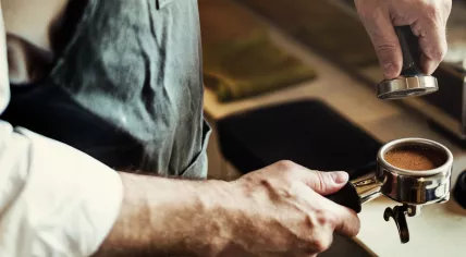 Barista making coffee