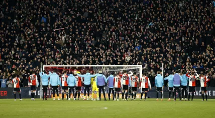 Feyenoord players celebrate in front of the supporters after the Dutch eredivisie match between Feyenoord and FC Groningen in Feyenoord Stadium de Kuip op 4 march 2023 in Rotterdam, Netherlands