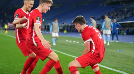 Jesper Karlsson of AZ Alkmaar, Sven Mijnans of AZ Alkmaar, Milos Kerkez of AZ Alkmaar celebrate the 1-2 during the UEFA Conference league last 16 match between SS Lazio and AZ Alkmaar in Stadio Olimpico on 7 march 2023 in Rome, Italy