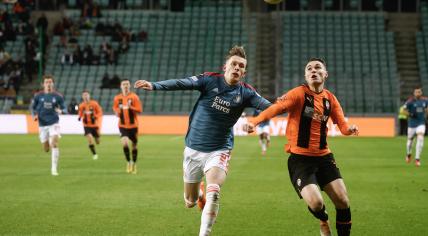 Feyenoord's Norwegian defender Marcus Holmgren Pedersen and Shakhtar Donetsk's Ukrainian forward Dmytro Topalov vie for the ball during the UEFA Europa League