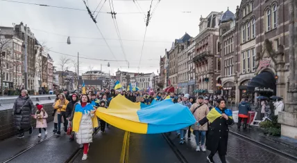 Protestors gathered in Amsterdam call for an end to the war in Ukraine and Russia's withdrawal from that country. 24 Feb. 2023
