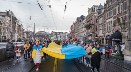 Protestors gathered in Amsterdam call for an end to the war in Ukraine and Russia's withdrawal from that country. 24 Feb. 2023