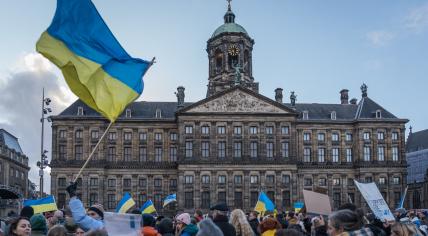 Protestors gathered in Amsterdam call for an end to the war in Ukraine and Russia's withdrawal from that country. 24 Feb. 2023