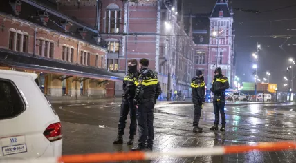 Police at the scene of a stabbing at the Ibis hotel next to Amsterdam Central Station, 9 March 2023