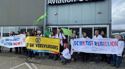 Scientist Rebellion protesters block private jet area at Eindhoven Airport, March 2023.