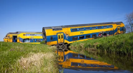 A cab-control car and coach from a NS night train service that derailed in an accident with a crane in Voorschoten. 4 April 2023