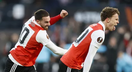 Orkun Kokcu of Feyenoord, Mats Wieffer of Feyenoord celebrate the 1-0 during the UEFA Europa League quarter final match between Feyenoord and AS Roma in Feyenoord Stadium de Kuip on 13 april 2023 in Rotterdam, Netherlands.