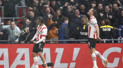 Xavi Simons of PSV Eindhoven, Luuk de Jong of PSV Eindhoven celebrate the 3-0 in the Dutch eredivisie match between PSV Eindhoven and Ajax Amsterdam in the Phillips stadium on 23 april 2023 in Eindhoven, Netherlands