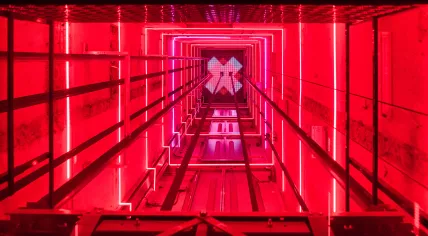 The elevator shaft guests look at as they travel up to the panorama restaurant, bar and rooftop deck at the Adam Toren in Amsterdam. 2018
