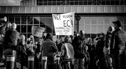 Amsterdam-Zuid locals protest against plans for an erotic center in their district during a district council meeting at the RAI, 12 April 2023