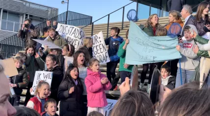 Amsterdam-Zuid locals protest against plans for an erotic center in their district during a district council meeting at the RAI, 12 April 2023