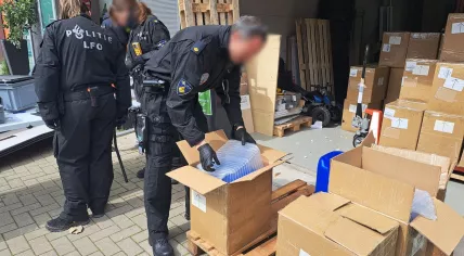 Police search a Ridderkerk storage space as part of an investigation into drug and weapons trafficking. 18 April 2023