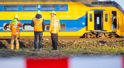 ProRail workers at the scene of a fatal train crash in Voorschoten, 4 April 2023