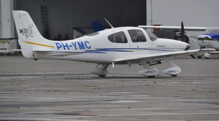 A Cirrus Design SR-20 with Dutch registration PH-YMC at Rotterdam-The Hague Airport. 24 September 2014