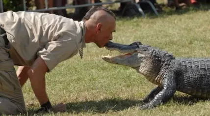 Ferry Torrez with one of his crocodile
